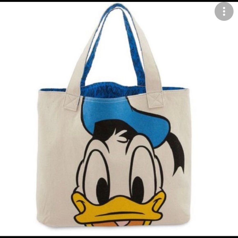 Donald tote bag. Disney store NWOT - frown on one side smile on other